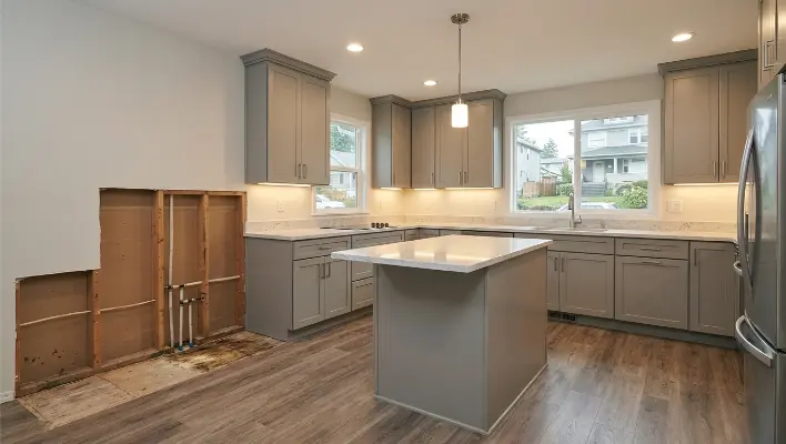 Is a Kitchen Remodel Worth It? ROI for Tacoma Homes — a tablet showing a kitchen remodel budget spreadsheet next to itemized quotes, a tape measure, and a local Tacoma neighborhood map highlighting the Stadium District.kitchen remodel ROI Tacoma 