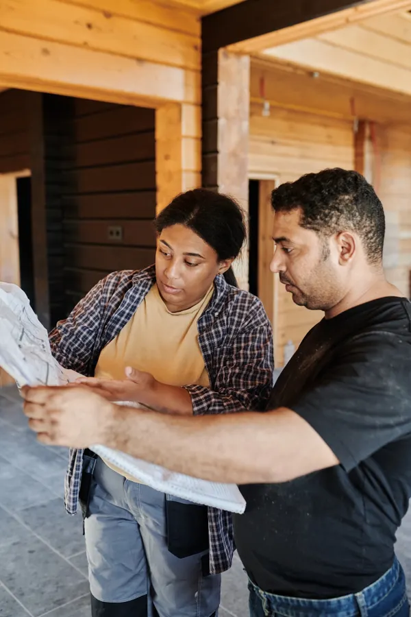 Renovation contractor meeting with a client in a Tacoma kitchen