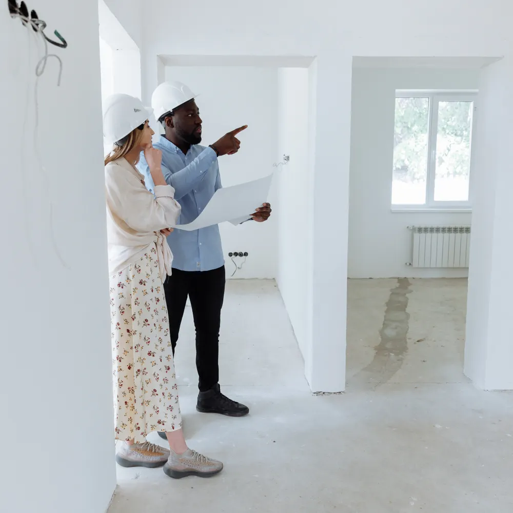 Homeowner discussing remodel details with a contractor in Tacoma