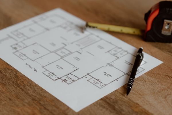 Contractor reviewing kitchen remodel plans and estimates in Tacoma