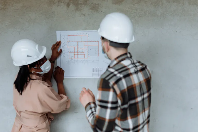 Contractor reviewing plans with a homeowner in Tacoma