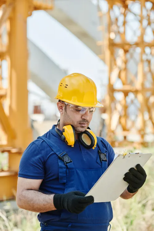 Kitchen contractor in a hard hat on a Tacoma job site